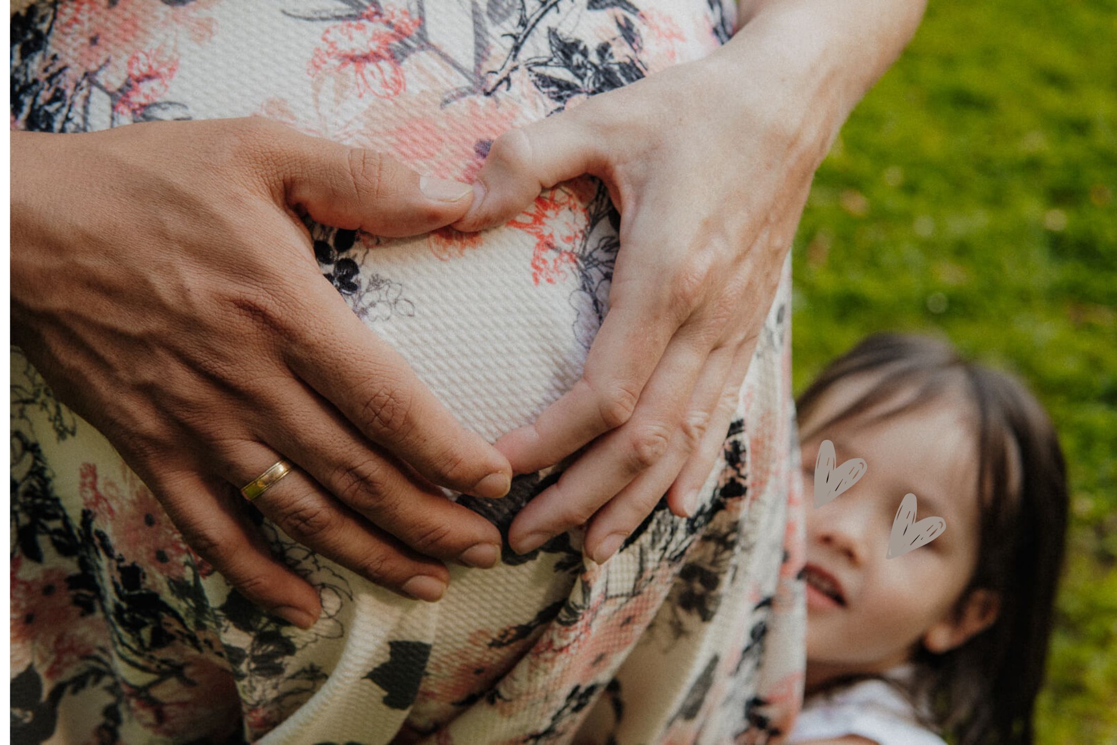 Babybauch Hände bilden Herz